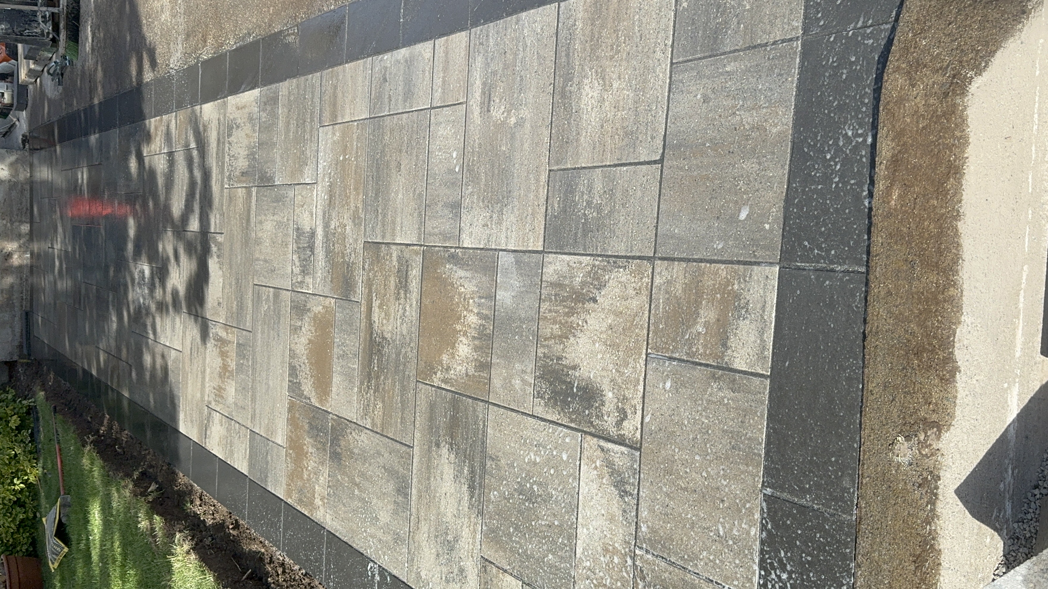 Elegant front entry steps with large slab treads and chiseled edge nosing